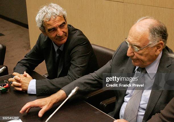 France national team coach Raymond Domenech and ex-French Football Federation president Jean-Pierre Escalettes attend a hearing in front of the...