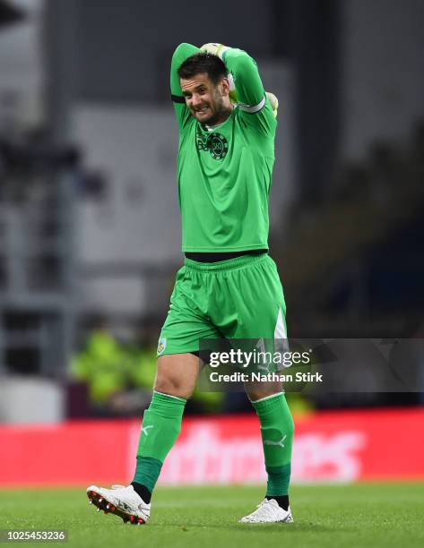 Tom Heaton of Burnley holds his hands on his head during the UEFA Europa League qualifing play-off second leg match between Burnley and Olympiakos at...