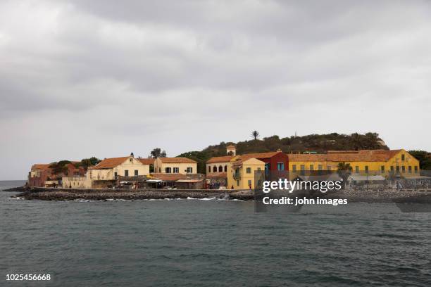 the island of goree or goree is both an island in the north atlantic ocean - human trafficking stock pictures, royalty-free photos & images