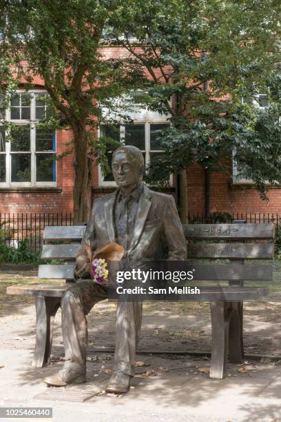 Fresh flowers rest at the Alan Turing Memorial in Sackville Park along Fairfield Street on the 10th August 2018 in Manchester in the United Kingdom....