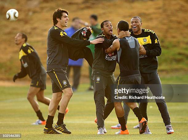 Kaka, Robinho, Julio Baptista and Luis Fabiano fool around during the Brazil team training session at St Stithians College on June 30, 2010 in...