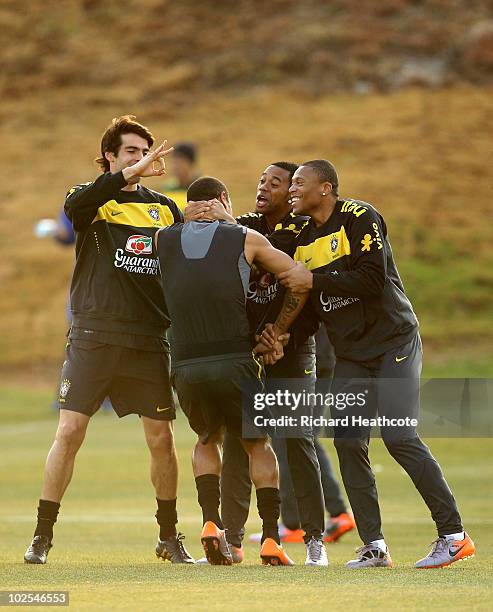 Kaka, Robinho, Julio Baptista and Luis Fabiano fool around during the Brazil team training session at St Stithians College on June 30, 2010 in...