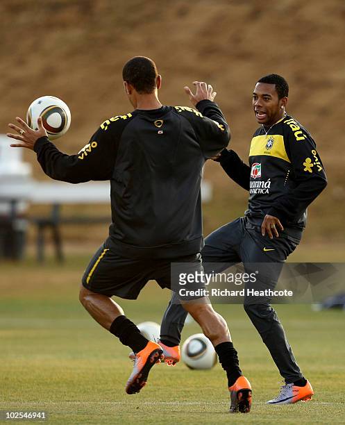 Robinho and Luis Fabiano in action during the Brazil team training session at St Stithians College on June 30, 2010 in Johannesburg, South Africa....