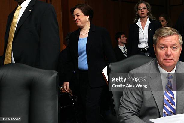 Supreme Court nominee Elena Kagan returns after a break during the third day of her confirmation hearings before the Senate Judiciary Committee as...