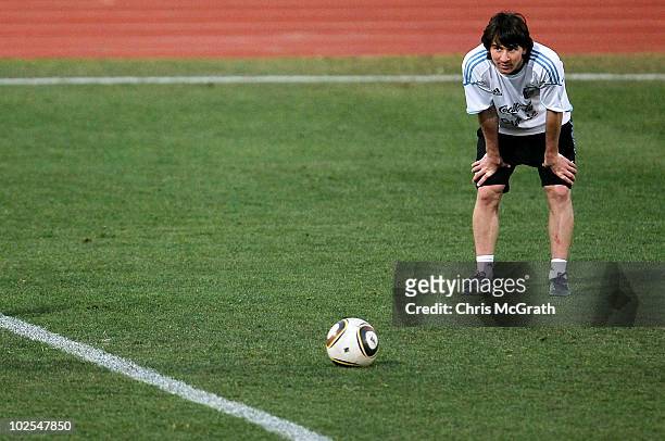 Lionel Messi of Argentina looks on as he waits to take a penalty during a training session ahead of their FIFA 2010 World Cup quarter-final match...