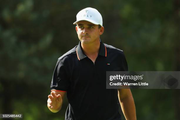 Christiaan Bezuidenhout of South Africa acknowledges the crowd after getting a birdie on the 16th hole during day two of the Made in Denmark played...