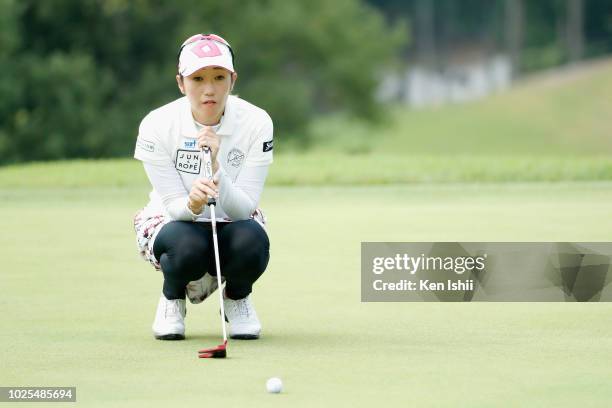 Akane Iijima of Japan prepares to putt on the first hole during the first round of the Golf5 Ladies at Mizunami Country Club on August 31, 2018 in...