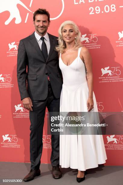 Lady Gaga and Bradley Cooper attend 'A Star Is Born' photocall during the 75th Venice Film Festival at Sala Casino on August 31, 2018 in Venice,...