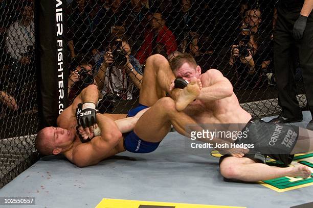 Georges St-Pierre def. Matt Hughes - Submission - 4:54 round 2 during UFC 79 at Mandalay Bay Events Center on December 29, 2007 in Las Vegas, Nevada.