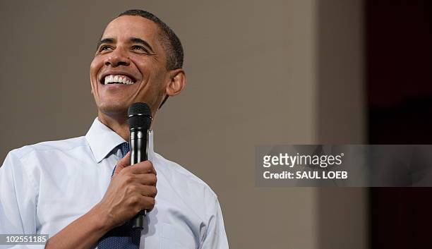 President Barack Obama speaks during a town hall event on the economy at Racine Memorial Hall in Racine, Wisconsin, June 30, 2010. AFP PHOTO / Saul...