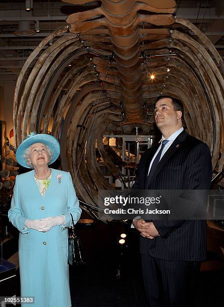 Queen Elizabeth II looks at a whale skeleton as she visits the Canadian Museum of Nature on June 30, 2010 in Ottawa, Canada. The Queen and Duke of...