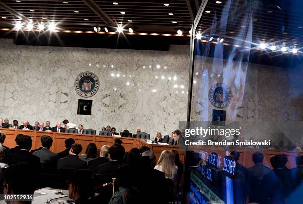 Supreme Court nominee Elena Kagan image is projected on a TV screen as she answers questions from members of the Senate Judiciary Committee on the...