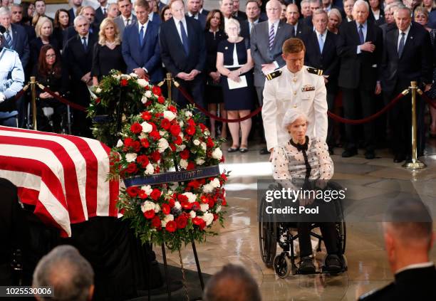 Roberta McCain, mother of late U.S. Senator John McCain, is assisted after viewing her son's casket during ceremonies honoring the late US Senator...