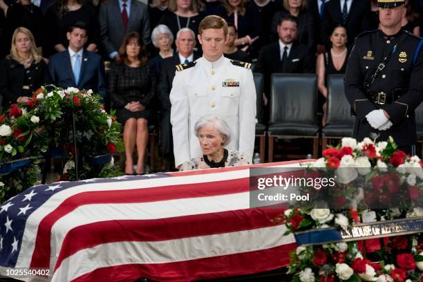 Roberta McCain, mother of, Sen. John McCain, R-Ariz., sits in front of her son's casket as he lies in state in the Rotunda of the U.S. Capitol, on...