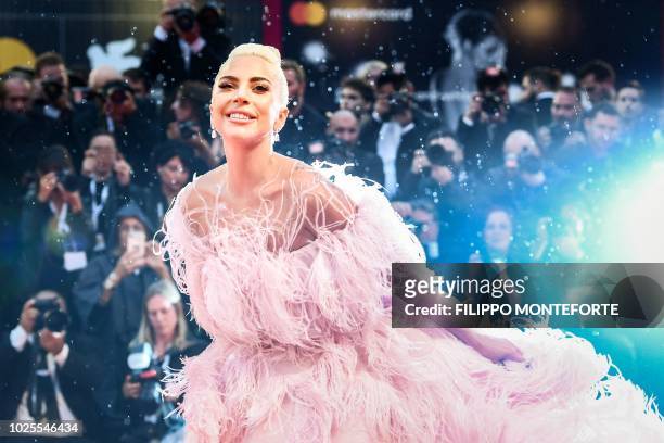 Singer and actress Lady Gaga arrives for the premiere of the film "A Star is Born" presented out of competition on August 31, 2018 during the 75th...