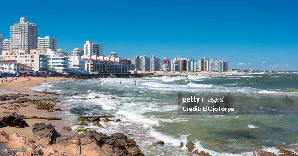 View of beach in Punta del Este city, tourists in the beach, summertime, Uruguay