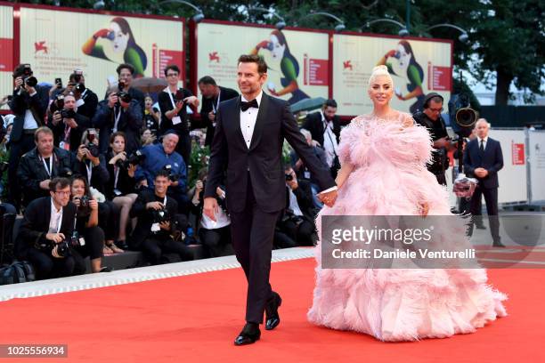 Bradley Cooper and Lady Gaga walks the red carpet ahead of the 'A Star Is Born' screening during the 75th Venice Film Festival at Sala Grande on...