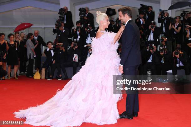 Actress and singer Lady Gaga and Actor Bradley Cooper walks the red carpet ahead of the 'A Star Is Born' screening during the 75th Venice Film...