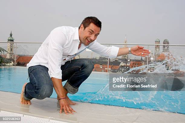 Host Marco Schreyl attends the Photocall for his campaign 'Schutzengel 2011' for cystic fibrosis at the new 'China Moon Roof Terrace' at the Mandarin...