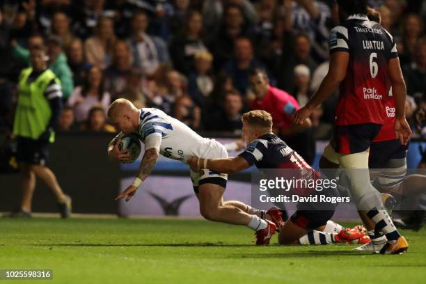 Tom Homer of Bath Rugby scores a try during the Gallagher Premiership Rugby match between Bristol Bears and Bath Rugby at Ashton Gate on August 31,...