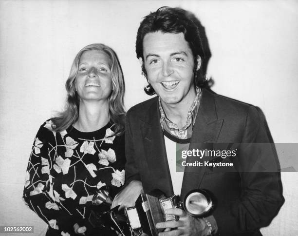 Paul McCartney and his wife Linda attend the 13th Grammy Awards at the Hollywood Palladium, Los Angeles, 16th March 1971. Paul is collecting the...