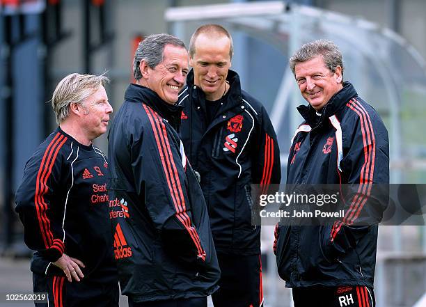 Roy Hodgson manager of Liverpool FC speaks with Darren Burgess Head of Fitness and Conditioning, Assistant Manager Sammy Lee and Peter Brukner, Head...