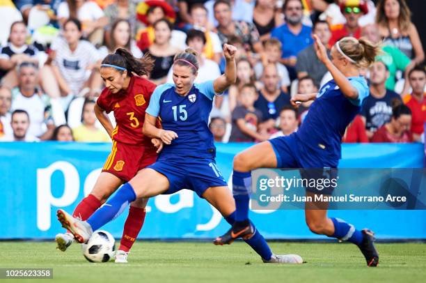Nahikari Garcia of Spain and Natalia Kuikka of Finland compete for the ball during the FIFA Women's World Cup 2019 qualifier between Spain and...