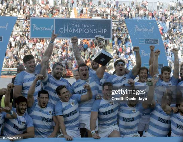 Agustin Creevy of Argentina lifts the trophy at the end of a match between Argentina and South Africa as part of The Rugby Championship 2018 at...