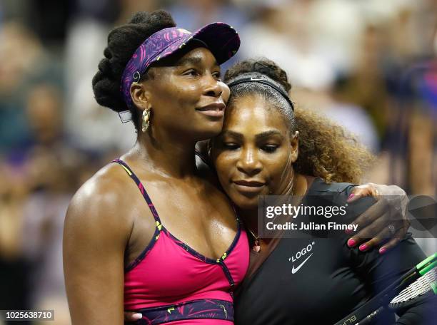 Serena Williams of The United States is congratulated by her sister and opponant Venus Williams of The United States following their ladies singles...