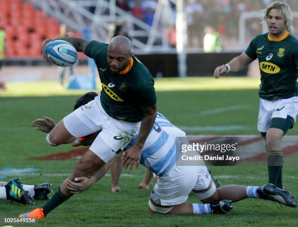 Lionel Mapoe of South Africa is tackled during a match between Argentina and South Africa as part of The Rugby Championship 2018 at Malvinas...