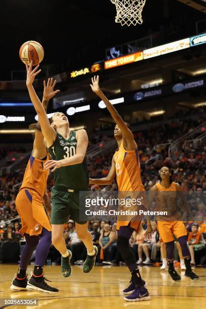 Breanna Stewart of the Seattle Storm attempts a shot over Brittney Griner of the Phoenix Mercury during game three of the WNBA Western Conference...