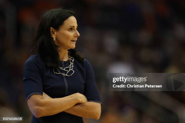 Head Coach Sandy Brondello of the Phoenix Mercury watches from the bench during game three of the WNBA Western Conference Finals against the Seattle...