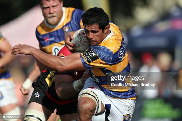 Bay of Plenty's Tanerau Latimer is tackled during the round three Mitre 10 Cup match between Bay of Plenty and Canterbury on September 1, 2018 in...