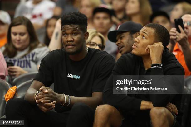 Deandre Ayton and George King of the Phoenix Suns attend game three of the WNBA Western Conference Finals between the Phoenix Mercury and the Seattle...