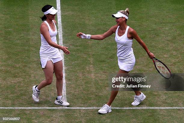 Martina Hingis of Switzerland and Anna Kournikova of Russia in action during their Ladies Invitational Doubles match against Helena Sukova of Czech...