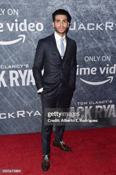 Mena Massoud attends the premiere of Amazon Prime's of "Tom Clancy's Jack Ryan" at the Battleship Iowa on August 31, 2018 in San Pedro, California.