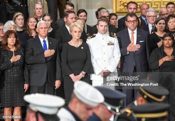 Cindy MCCain and her son Jack stand along with Vice President Mike Pence and his wife Karen as the body of late-Sen. John S. McCain arrives to lie in...