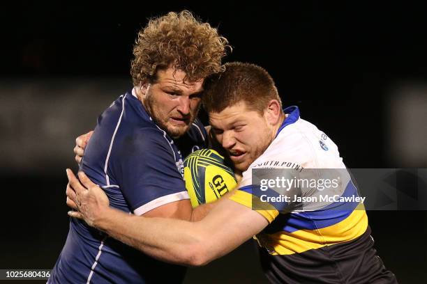 James Slipper of Queensland is tackled by Blake Enever of the Vikings during the round one NRC match between Canberra Vikings and Queensland Country...