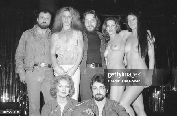 American actress Marilyn Chambers poses with cast and crew members from 'Let My People Come: A Sexual Musical' at the Village Gate, New York, New...