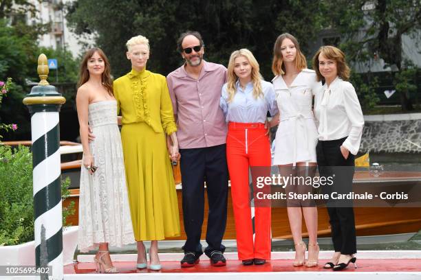 Dakota Johnson, Tilda Swinton, Luca Guadagnino, Chloe Grace Moretz, Mia Goth and Jessica Harper are seen arriving at the 75th Venice Film Festival on...