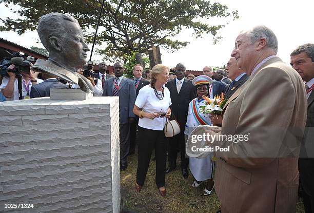 Queen Paola and King Albert II of Belgium inaugurate a statue of King Boudewijn as they visit the King Boudewijn Hospital on July 1, 2010 in...