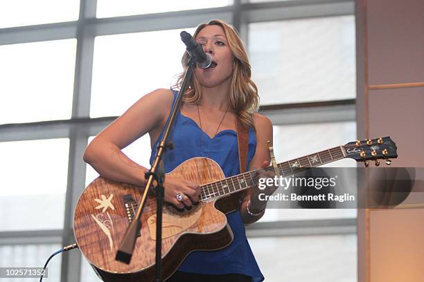 Recording artist Colbie Caillat performs during the VH1 Save The Music Foundation Summer Kick-Off Party benefit at the W Hoboken on May 23, 2010 in...