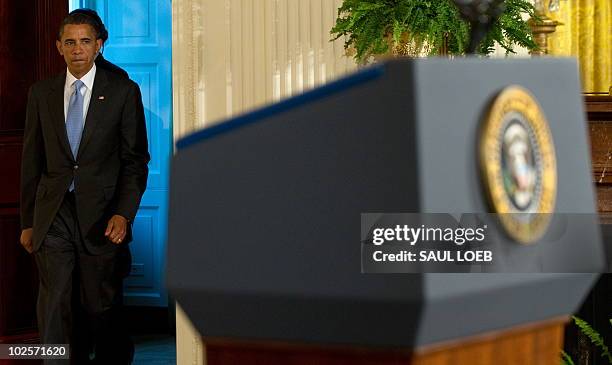 President Barack Obama arrives to sign the Iran Sanctions Bill in the East Room of the White House in Washington, DC, July 1, 2010. AFP PHOTO / Saul...