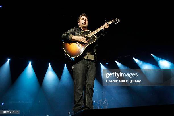 American Idol season nine winner Lee DeWyze performs during the 2010 American Idol Live! tour opener at The Palace of Auburn Hills on July 1, 2010 in...