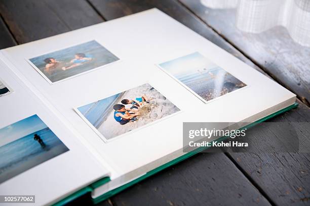 photo album of brothers - photograph album stock pictures, royalty-free photos & images
