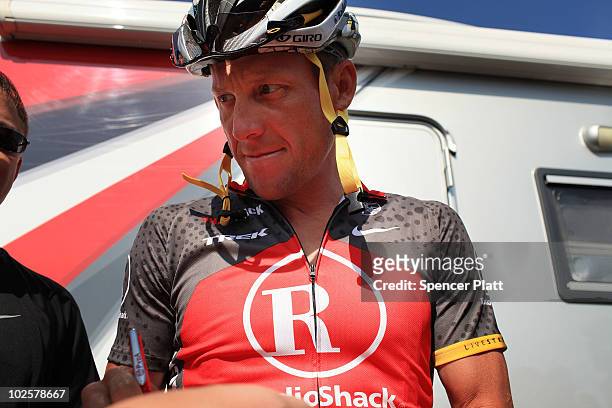 Cyclist Lance Armstrong of Team Radio Shack signs autographs following training on July 2, 2010 in Rotterdam, Netherlands. Following a prologue time...