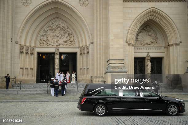 Joint service military casket team carries casket of the late Senator John McCain into the Washington National Cathedral for the funeral service for...