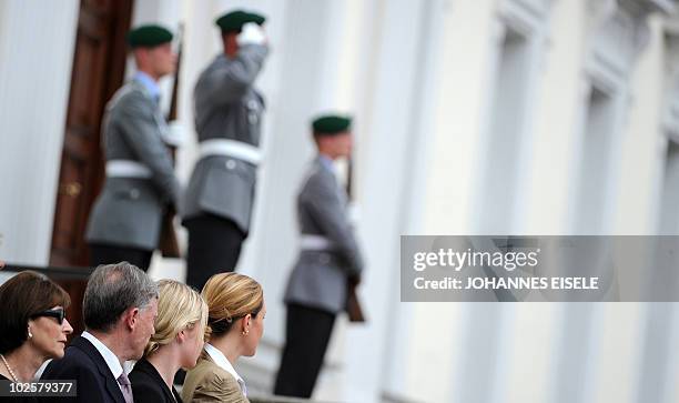Former German President Horst Koehler , his wife Eva Luise Koehler , Annalena Wulff and Bettina Wulff watch as Germany's new President Christian...