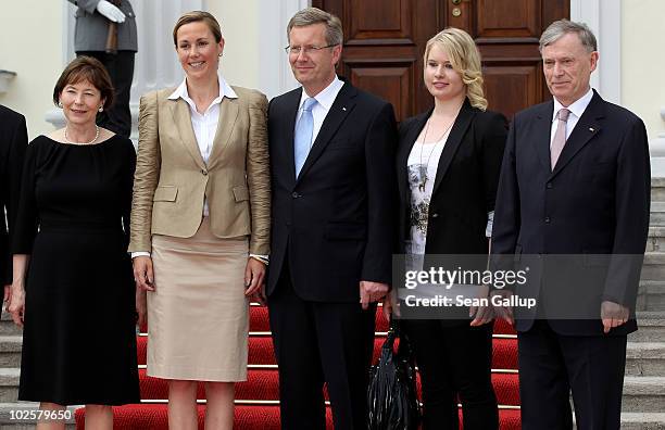 New German President Christian Wulff and his wife, First Lady Bettina Wulff , pose with former First Lady Eva Luise Koehler, Wullf's daughter...