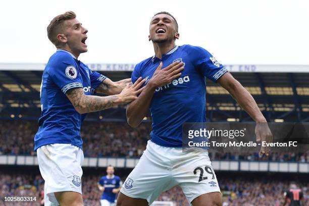 Dominic Calvert-Lewin of Everton celebrates his goal with Lucas Digne during the Premier League match between Everton and Huddersfield Town at...